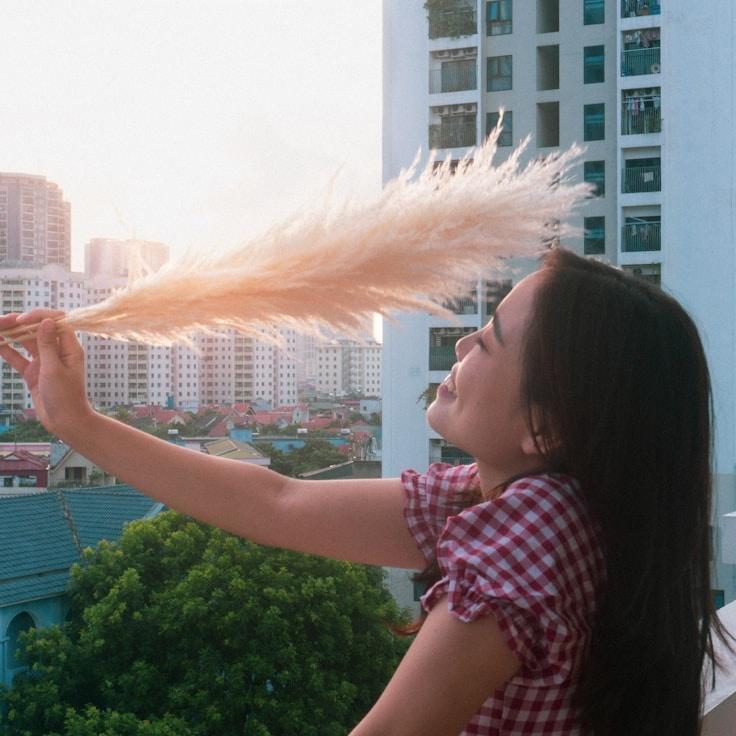 Portrait of Aria Chen, group coordinator and fusion cooking expert